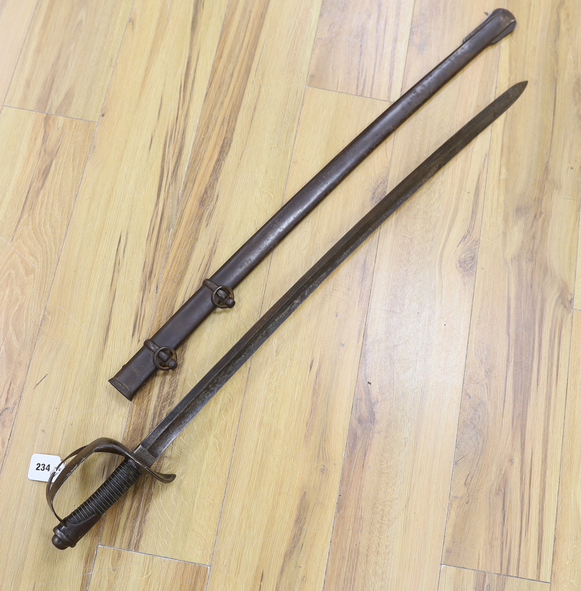 A pair of late 19th century German swords and scabbards, made for the international arms trade, probably in Solingen, blade 89cm, Please note this lot attracts an additional import tax of 5% on the hammer price 109cm lon